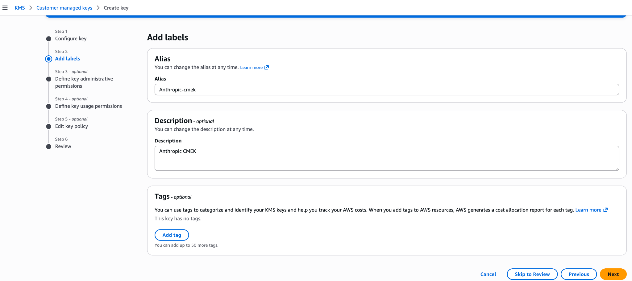 AWS KMS Add labels step with an alias of juglow-cmek and a description of Juglow CMEK.