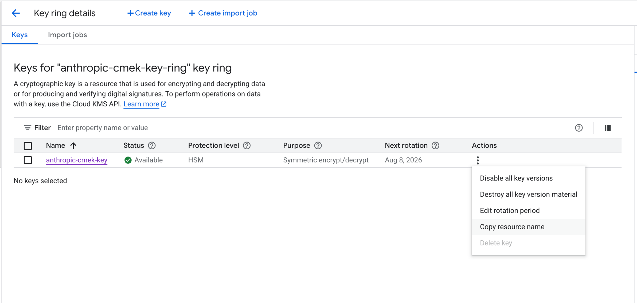 Detail key ring di Google Cloud dengan tindakan Copy resource name disorot di menu tindakan kunci.